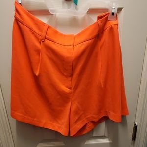 Neon orange shorts